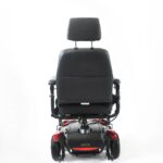 Back view of the Merits Junior wheelchair, showcasing its sturdy frame, well-aligned wheels, and ergonomic design for reliable support and smooth mobility