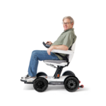 Senior man sitting on a Robooter X40 Automatic Folding All-Terrain Smart Powerchair