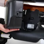 Close up of the removable battery being inserted into the Golden Ally GP303 power chair