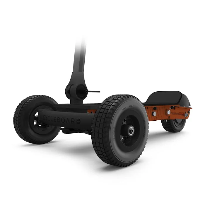 Rear view of a three wheel adult electric quad showing its mixed terrain tires
