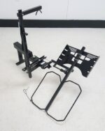 Tilt N Tote Model 001 tilted loading position showing hitch shank and safety cable