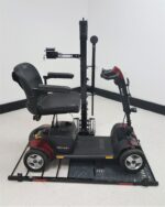 Hold N Go US218 carrying a travel scooter with hold down arm engaged